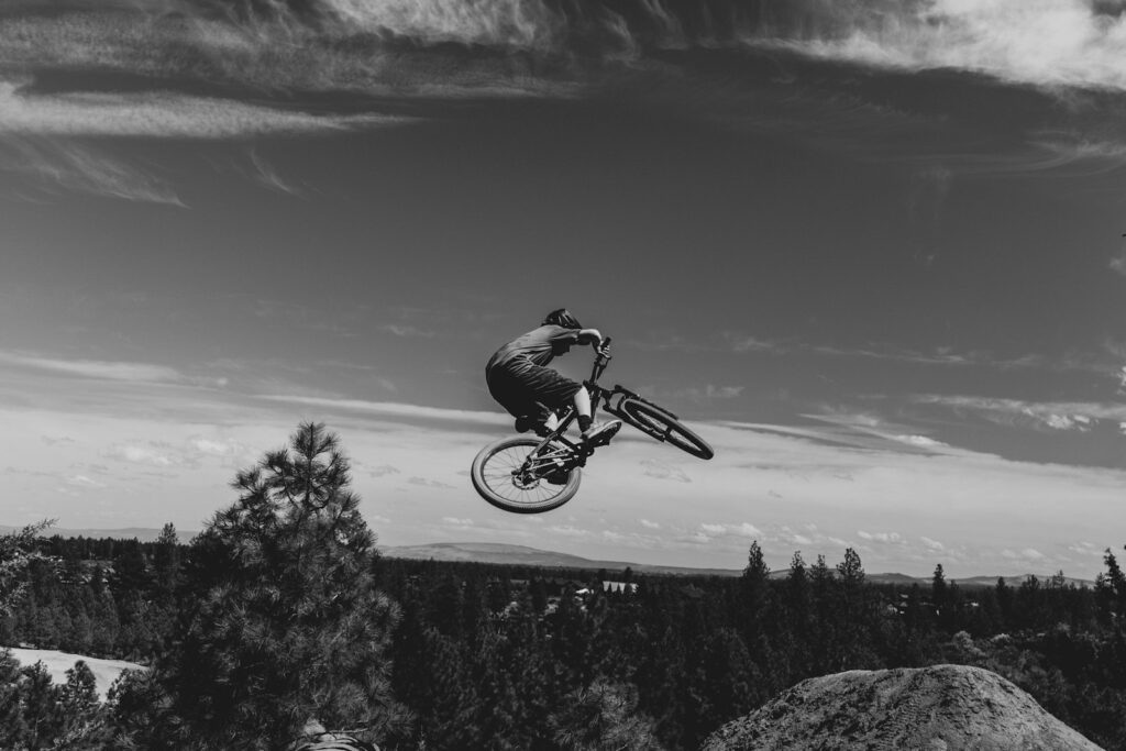 Biker soars through the air during a jump.